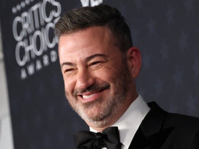 TV host Jimmy Kimmel poses in the press room with the Best Talk Show award for "Jimmy Kimm