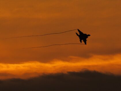 LAKENHEATH, ENGLAND - JANUARY 07: An F15 fighter plane takes off from RAF Lakenheath at su