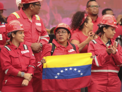 CARACAS, VENEZUELA - JANUARY 29: Workers of Venezuelan state oil company PDVSA attend in a