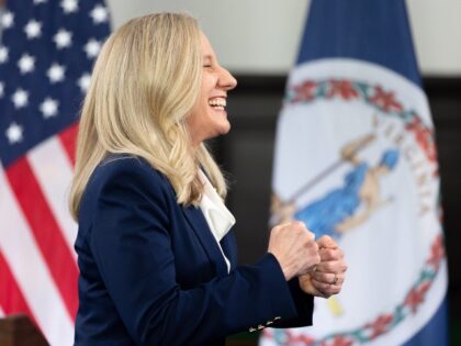 Virginia Gov. Abigail Spanberger celebrates after delivering the Democratic response to U.