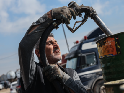 ERBIL, IRAQ - MARCH 17: A worker at a market for fuel oil and automotive fuel on March 17,