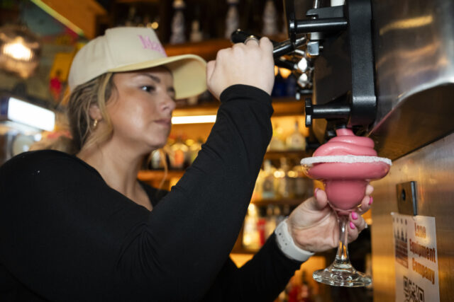 HOUSTON, TEXAS - MARCH 13: Kalli Lozano, co-owner Dona Leti's, makes a mix-fruit, sof