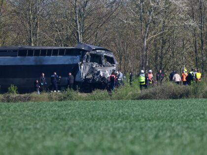 This photograph shows part of the TGV train after its collision at a level crossing after