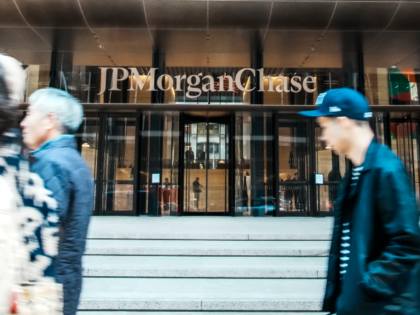 NEW YORK, NEW YORK - APRIL 06: People walk outside the JPMorgan Chase headquarters on Apri