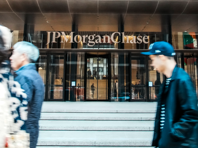NEW YORK, NEW YORK - APRIL 06: People walk outside the JPMorgan Chase headquarters on Apri