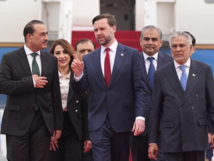 US Vice President JD Vance (C) walks with Pakistan's Chief of Defence Forces and Chief of