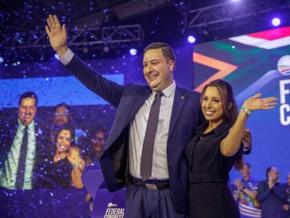 Newly elected federal leader of the Democratic Alliance (DA) Geordin Hill-Lewis (L) celebr