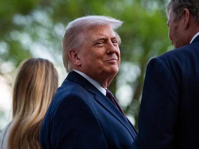 US President Donald Trump speaks with King Willem-Alexander of the Netherlands during an a