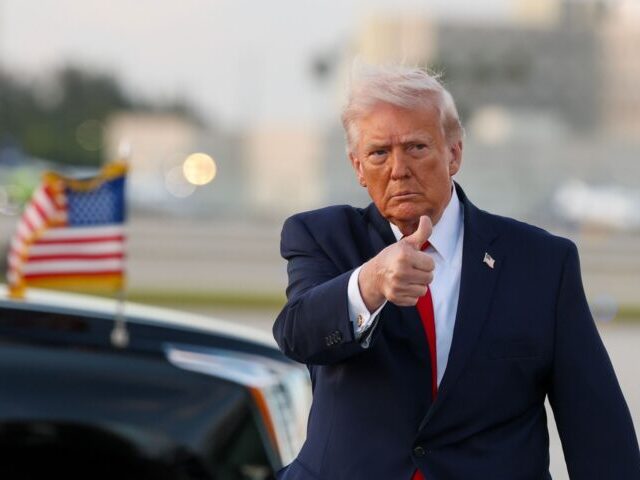 MIAMI, FLORIDA - APRIL 11: U.S. President Donald Trump waves to the media after walking of