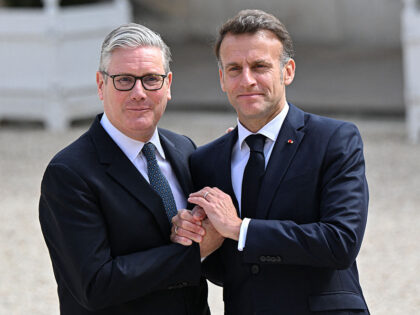 The Head of State Emmanuel Macron and the British Prime Minister Keir Starmer chair the co