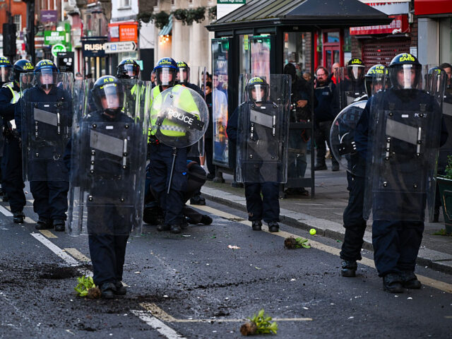 People Protest In Epsom Following Rape Of Woman In Her 20's EPSOM, ENGLAND - APRIL 15: Police are seen on Epsom high street as people come out to prot
