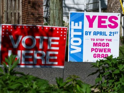 "Vote Here" and "Vote Yes" signage during a special election in Arlington, Virginia, US, o