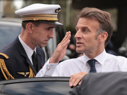 France's President Emmanuel Macron salutes Greek Prime Minister as he leaves the Stavros N