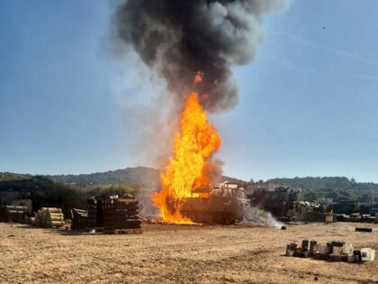 Smoke rises from an Israeli military position near the northern border town of Shomera, Is