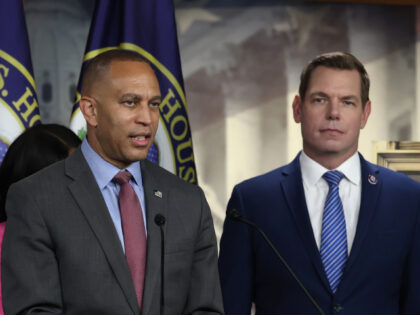 U.S. House Minority Leader Hakeem Jeffries (D-NY) (C) speaks at a news conference at the U