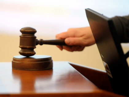 The gavel cracks on a foreclosure sale in the Public Trustees offices at the Wellington We