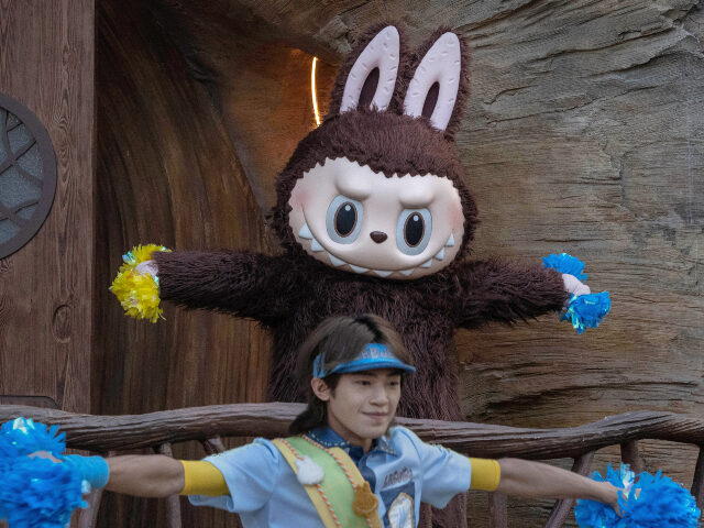 BEIJING, CHINA - JULY 16: A performer wears a costume of the Labubu character from Pop Mar