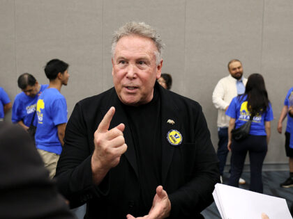 Anaheim, CA - May 30: Philanthropist and businessman Stephen Cloobeck speaks to reporters