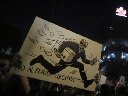 Hundreds of citizens gather outside the National Jury of Elections (JNE) to protest the re