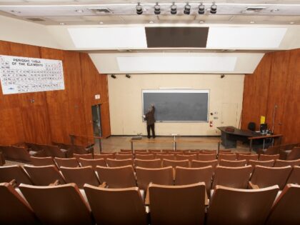 Professor in empty classroom