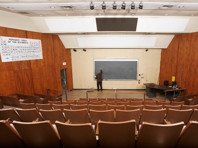 Professor in empty classroom