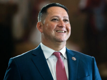 Rep. Tony Gonzales, R-Texas, is seen before the flag-draped casket bearing the remains of