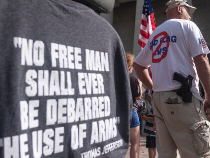 Gun owners and second amendment advocates gather at the Ohio State House to protest gun co