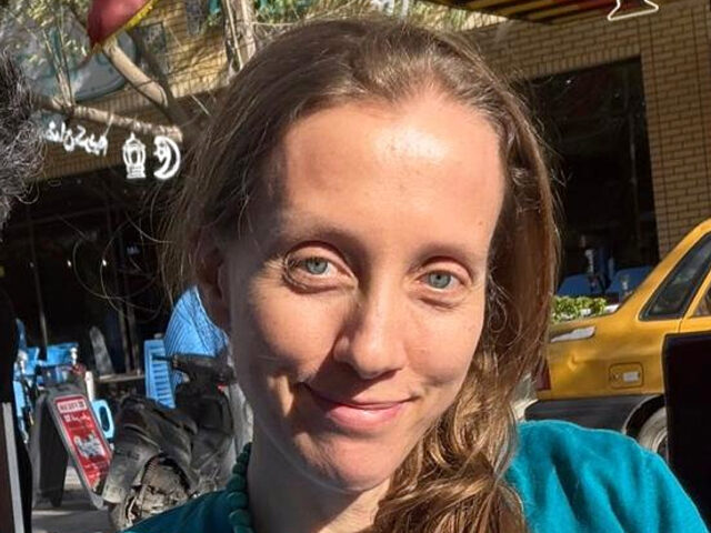 U.S. journalist Shelly Kittleson poses for a cellphone photo in a cafe in Baghdad, Iraq, M