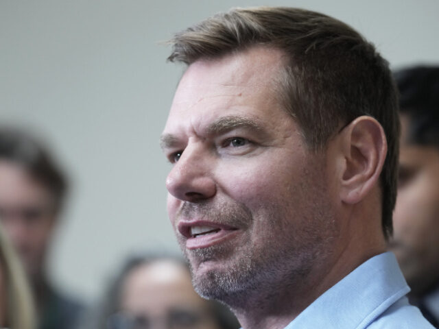 California gubernatorial candidate, Rep. Eric Swalwell, D-CA, talks with reporters after h