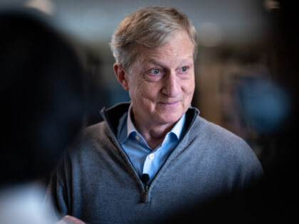 Panorama City, CA - February 06:California gubernatorial candidate Tom Steyer talks to dev