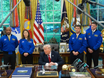 President Donald Trump speaks to reporters as he meets with NASA's Artemis II astrona