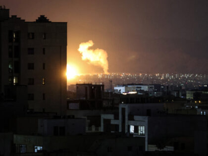 Smoke rises following airstrikes in a central area of the Iranian capital Tehran on March