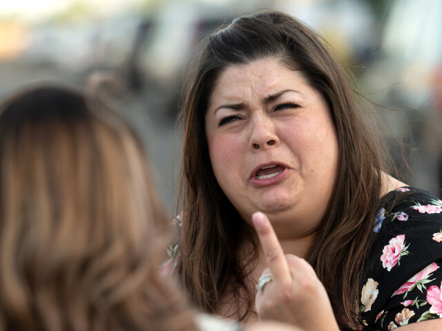 angry woman fighting with another woman