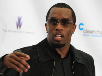 diddy Sean "Diddy" Combs, Entrepreneur stands for a photograph at the 121212 concert