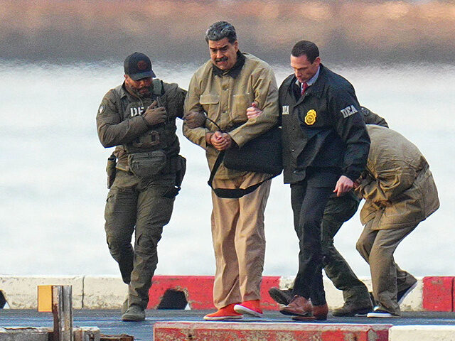 NEW YORK, NY - JANUARY 5: Nicolas Maduro and his wife, Cilia Flores, are seen in handcuffs