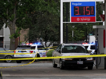 Members of Metropolitan Police Department respond to a shooting on H Street Northeast on A