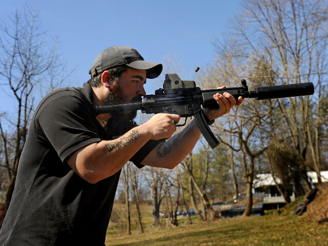 THURMONT, MD - MARCH 12: There's burst of smoke and ejecting shell as A.J. Wynne shoo