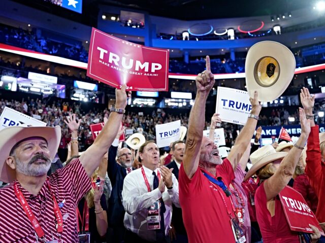 Delegates cheer during the Republican National Convention (RNC) at the Fiserv Forum in Mil