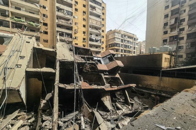 A collapsed building at the site of an Israeli airstrike in the Haret Hreik neighbourhood