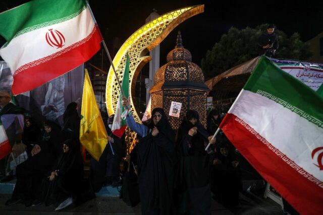 Demonstrators rally in support of Iran's supreme leader Ayatollah Mojtaba Khamenei at