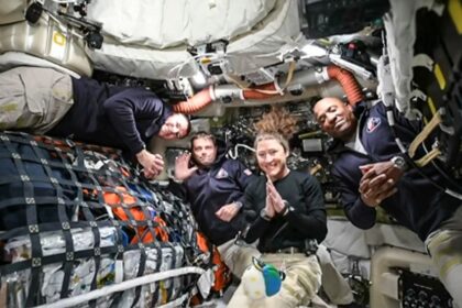 As the Orion spacecraft whips around the Moon the astronauts -- Americans Christina Koch,