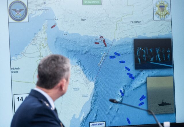 US Chairman of the Joint Chiefs of Staff General Dan Caine shows a map of the Strait of Ho