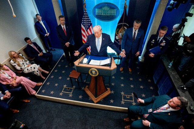 US President Donald Trump -- accompanied by CIA Director John Ratcliffe (C-L), Secretary o