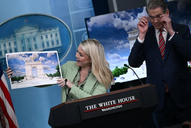 White House Press Secretary Karoline Leavitt shows off an artist's rendering of Presi