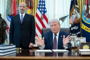 Trump signs executive order expanding federal role in mail voting