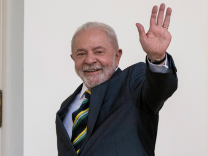Brazilian President Luiz Inacio Lula da Silva and President Joe Biden walk along the West