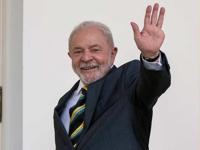 Brazilian President Luiz Inacio Lula da Silva and President Joe Biden walk along the West