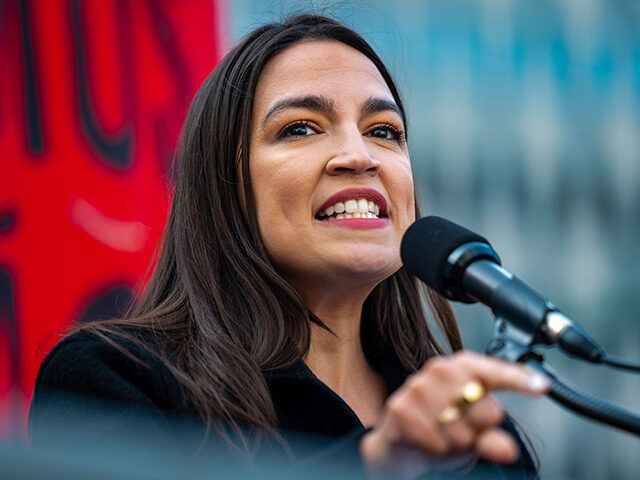 AP25121802523319 Title: May Day Labor Image ID: 25121802523319 Article: Rep. Alexandria Ocasio-Cortez (D-N.