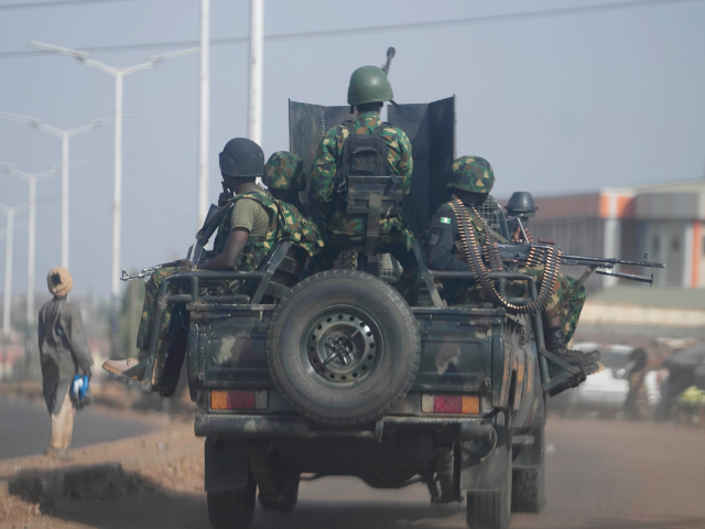 FILE - Nigeria army patrols along the Kaduna Birnin Gwari area in Nigeria, Friday, March 8