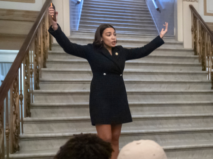 Rep. Alexandria Ocasio-Cortez, D-N.Y., gives a tour of the Capitol to a group of students